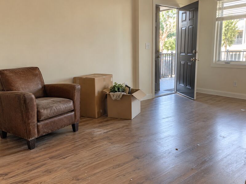 An apartment mid-clearout with a few items left