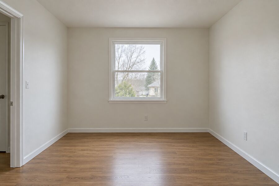 The same room finished with new drywall, flooring and trim